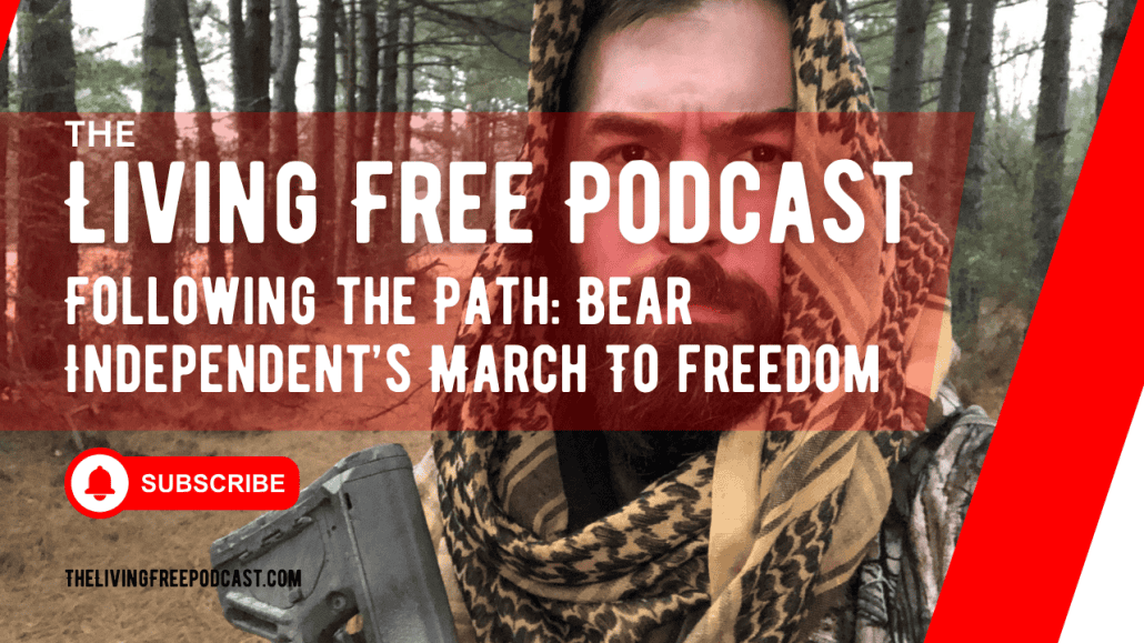 Woman in a forest holding a firearm, promoting self-reliance and freedom.