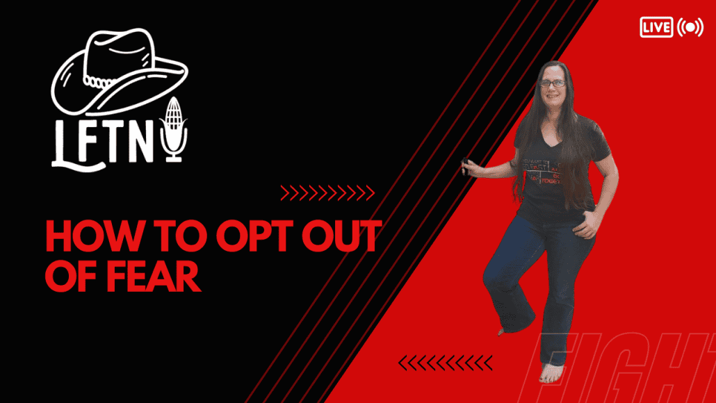 Woman speaking on live podcast about overcoming fear, titled "How To Opt Out Of Fear".