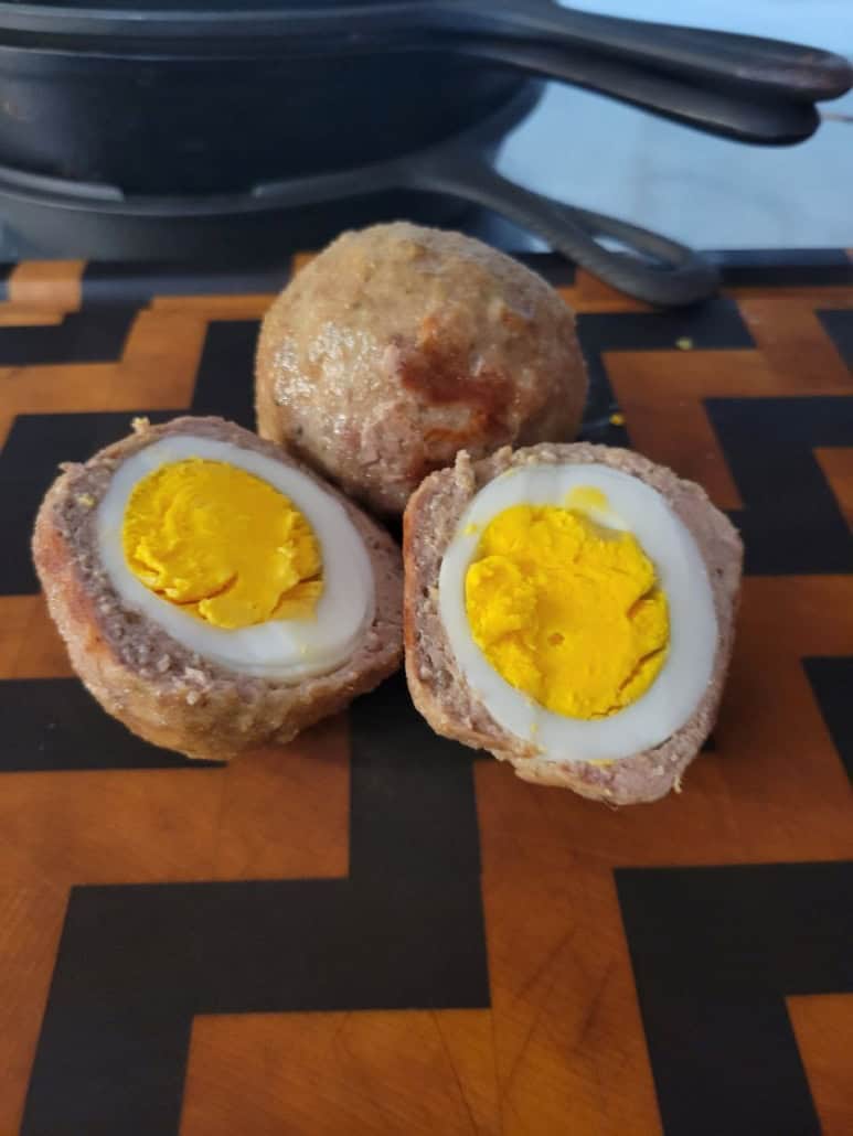 Egg-stuffed meatball with a crispy coating, perfect for keto and low-carb diets.